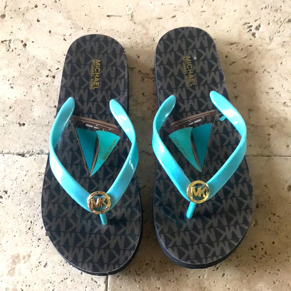 Michael Kors Turquoise flip flops